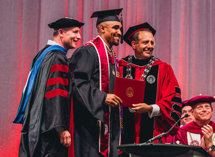 Hurts earned his second degree in May, a master’s in human relations.